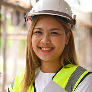 Contractor reviewing blueprints on a job site